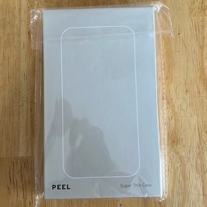 PEEL IPhone 13 Pro case. Clear hard plastic.